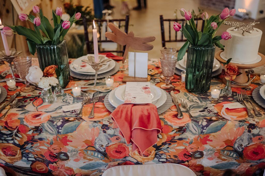 a colorful table setting demonstrates the perfect wedding setup.  Created by L&M Detailed Events; Wedding Planners in Louisville