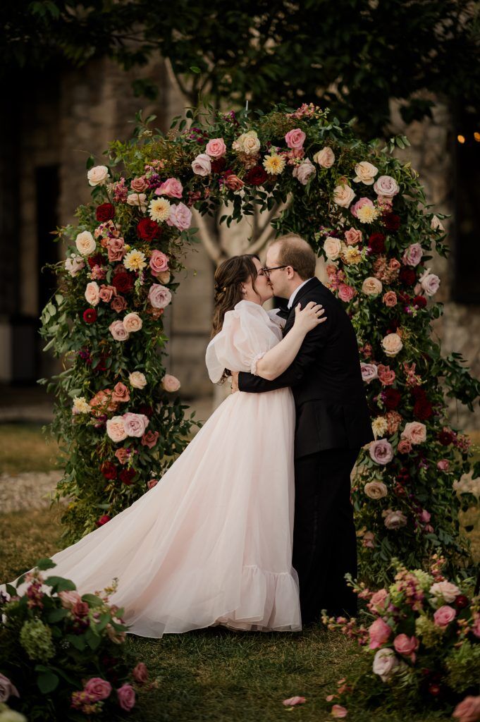 Photo of the first kiss taken by your Louisville Wedding Photographer Green Apple Photography