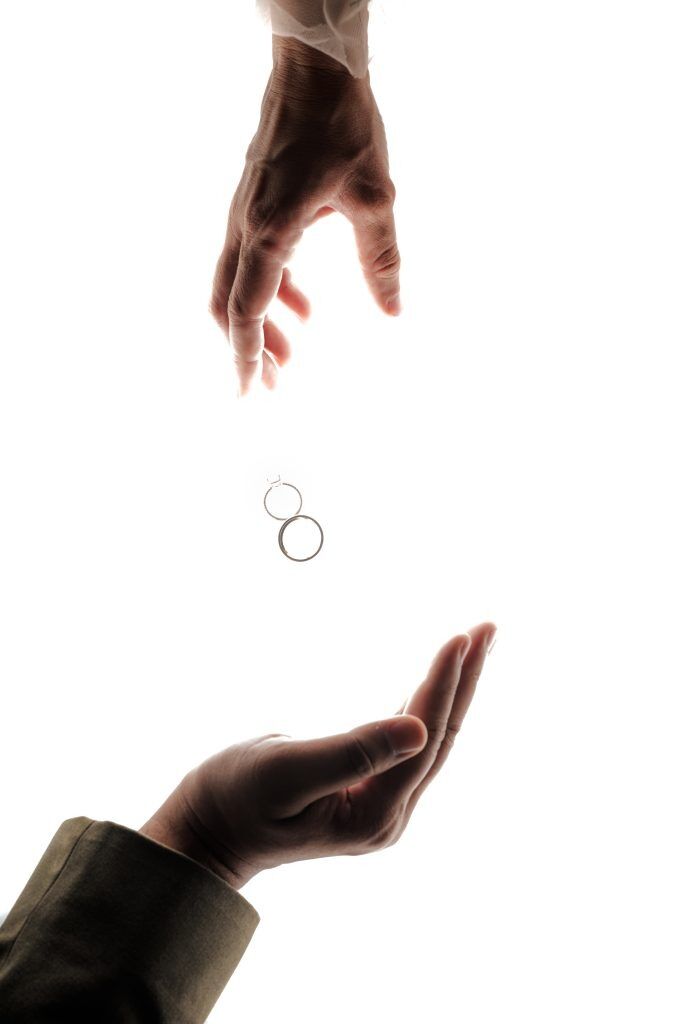 Louisville wedding photographer Christora Osters captures rings falling